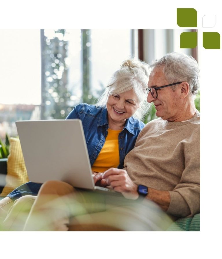 man and woman at computer signing up for email list